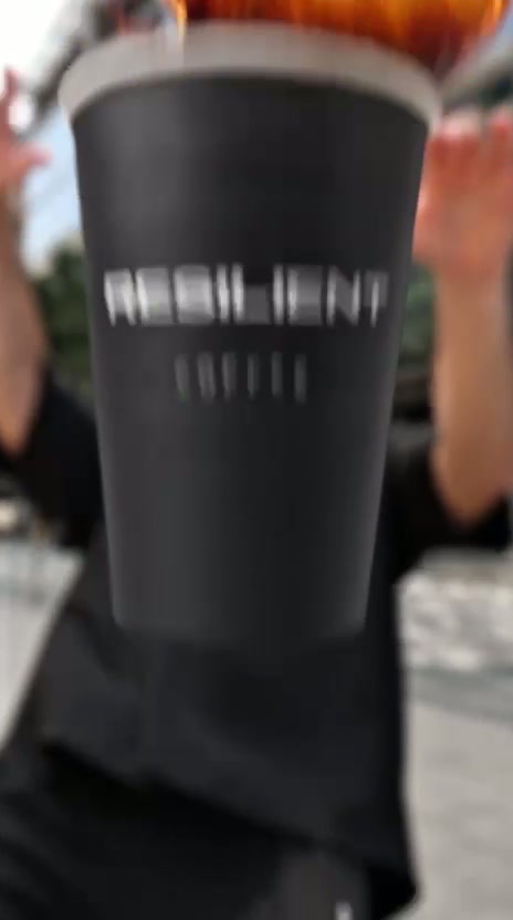 Moath falling as a coffee cup and objects fly through the air in the RESILIENT AI video